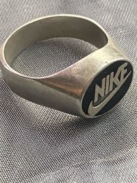 Vintage sterling silver NIKE black enameled logo