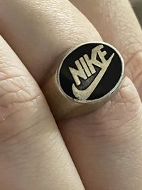 Vintage sterling silver NIKE black enameled logo