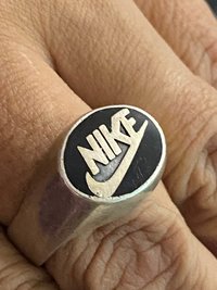 Vintage sterling silver NIKE black enameled logo