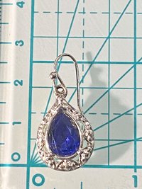 Vintage blue teardrop crystal halo NRT signed pendant on a silver chain with matching dangle earrings.