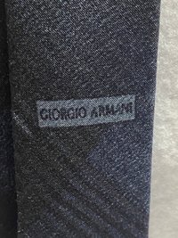 Black Textured Giorgio Armani necktie.