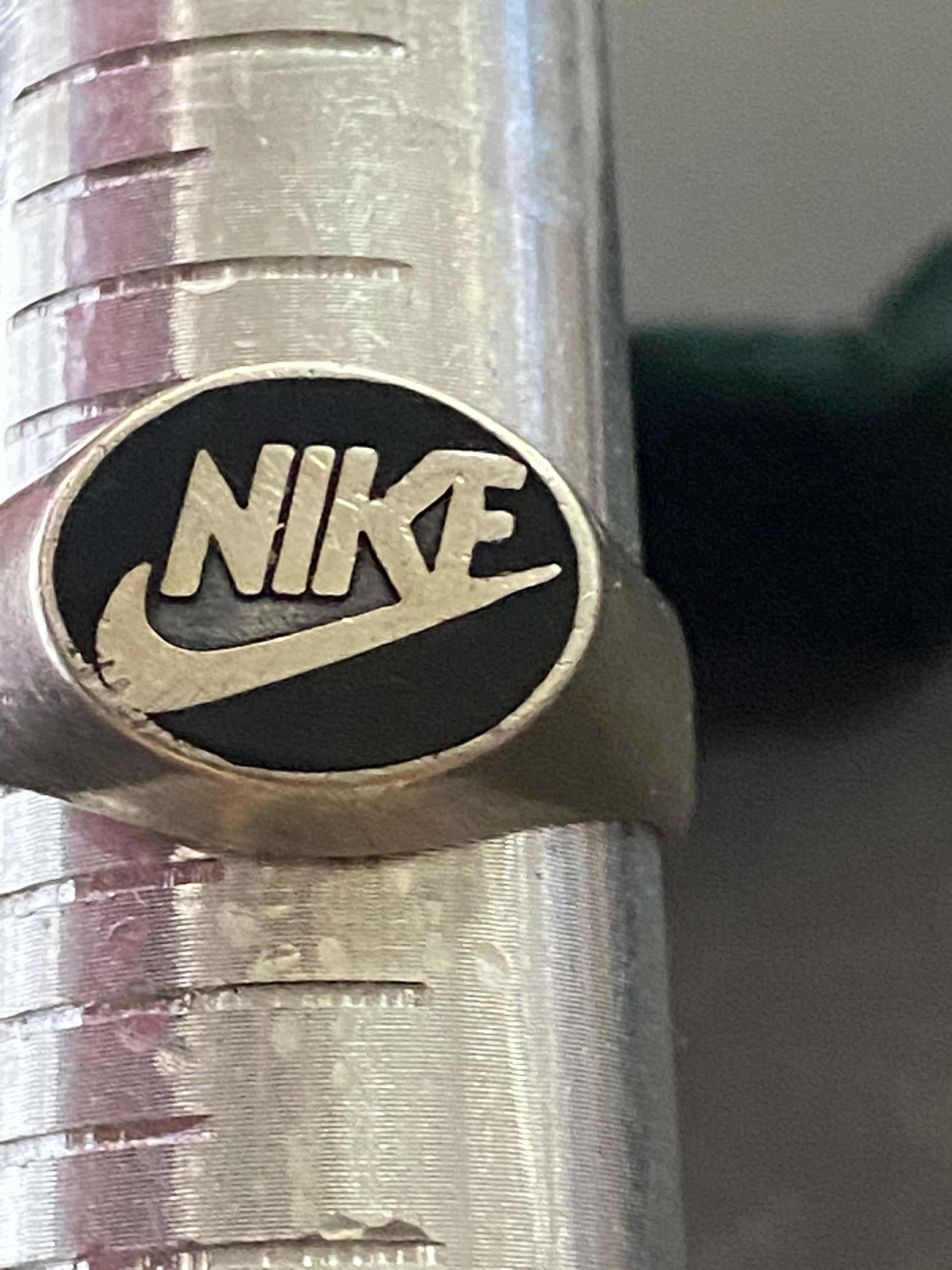 Vintage sterling silver NIKE black enameled logo